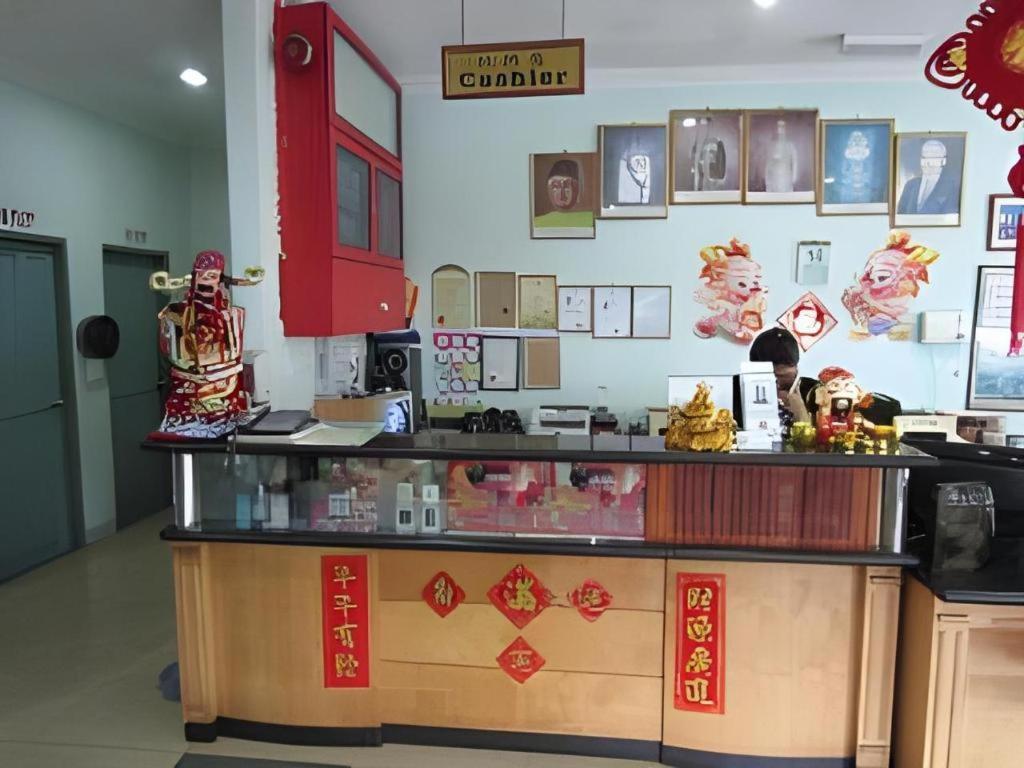 Hotel Hung Hung Кучинг Екстериор снимка