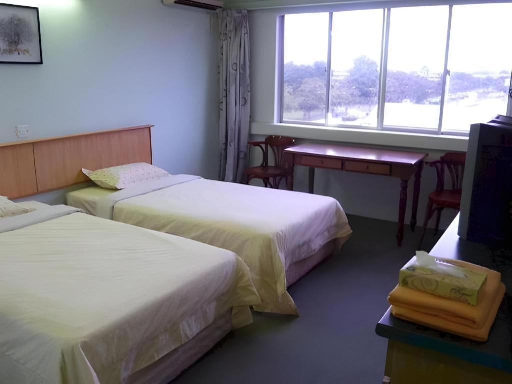 Hotel Hung Hung Кучинг Екстериор снимка